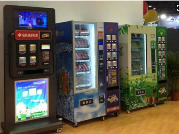 Self service terminal vending machine